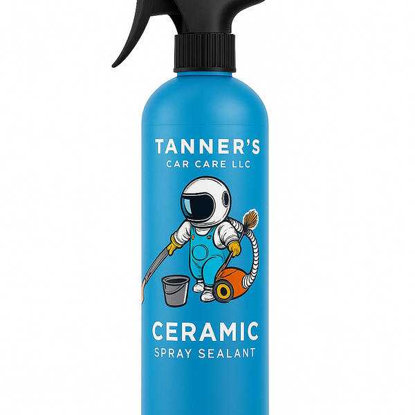 Blue spray bottle with black nozzle labeled 'Tanner's Car Care LLC' on a white background